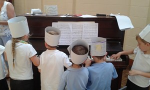 Exploring the piano at Llanelwedd Primary School