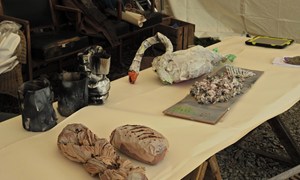 Papier mache swan, loaves, fish and tankards for the banquet scene